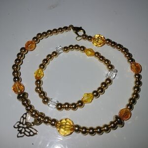 Handcrafted Mother /Child's Matching Gold Colored & Orange Beaded Bracelet Set.